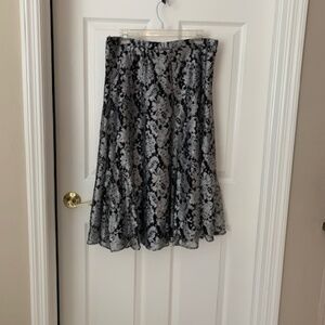 Gorgeous Black, White and Shiny Silver Patterned Skirt by Chico's